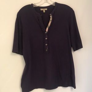 Purple Burberry knit polo with ruffle trim